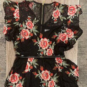 Black dress with red flowers.